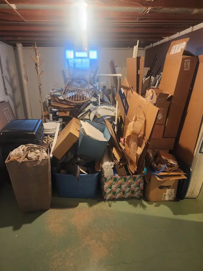 Roll-off dumpster container at job site for 6 Yard Dumpster Rental in Sudley